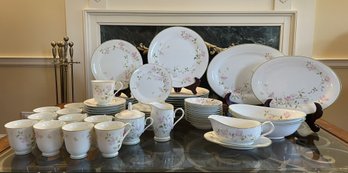 64pc Noritake First Blush Pattern Of Pink Florals, Yellow Butterflies, And Green Trim Dinnerware Set