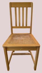 Light Wood Dining Chair With A Cane Seat