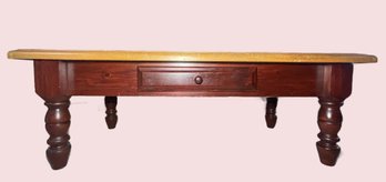 Rustic Wooden Coffee Table With A Single Drawer And Turned Legs