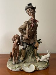 CAPODIMONTE PORCELAIN FIGURINE ' THE REPROACHFUL HUNTER WITH DOG AND CHICKEN SIGNED BY GIUSEPPE CAPPE