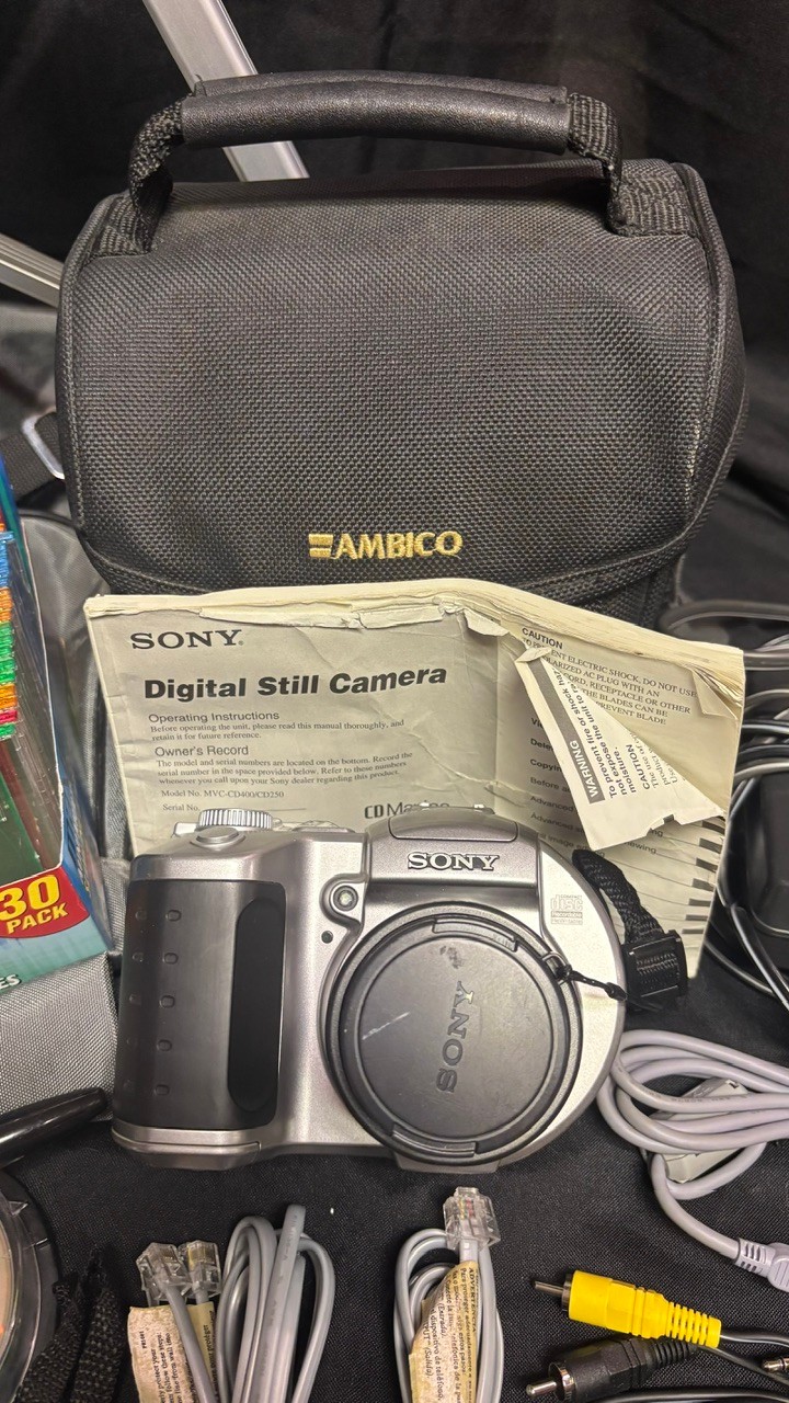 R9 Digital Camera Lot To Include Camera, Recording Discs Tripod, And ...