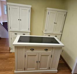 R3 Homestyles Nantucket Off-white Kitchen Island Featuring A Black Granite Inlay Top And Two Storage Cabinets