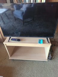 32in. Vizio TV, Wooden TV Stand, And Roku Unit