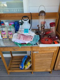 Bird Feeders, Plant Food, Sprayer, Wood Chips Bags, Rags, Hummingbird Food And Wood Work Table With Metal Top
