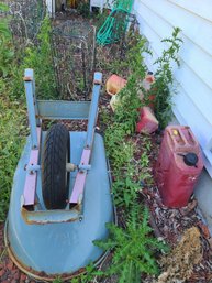 Wheel Barrel, Gas Cans, Hoses, 4 Crab Pots And A Duramax Flo'go 14 Gallon