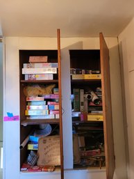 R13 Cabinet Full Of Assorted Puzzles, Games, Wigs, And Other Items