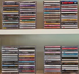 R1 Four CD Organizers Filled With CDs Including Artists Such As Neil Diamond, The Mamas And The Papas, Willie
