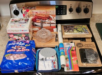 R2 Lot Of Assorted Kitchen Items To Include Items Such As Cast Iron Chuckwagon Dinner Bell, Cast Iron Grill