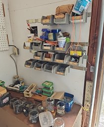 R0 Variety Of Nails, Screws, And Roll Of Paper Towels