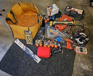 R0 A Variety Of Tools, A Tote Bag, Tire Chains, Rug, And Filter