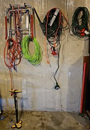 R0 Wall Items Including Extension Cords And Additional Items Plus A Foot Air Pump
