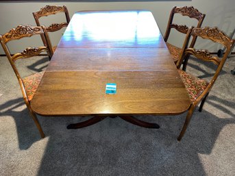 R13  Drop Leaf Dining Table And Chair Set. Solid Wood With One Leaf Chair Upholstery Protected By Plastic