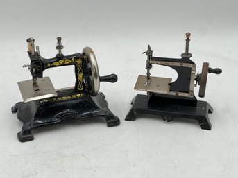 R2 Two Antique Children's Toy Sewing Machine.  Metal And A Heavy Cast Iron With Gold Decorations