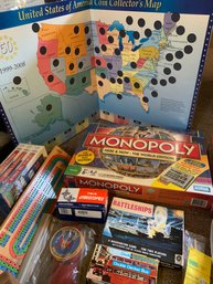 Assorted Games, Assorted Decks Of Cards, Mickey Mouse Bobble Head, Cribbage Boards, VCR Tape Set, Game Books