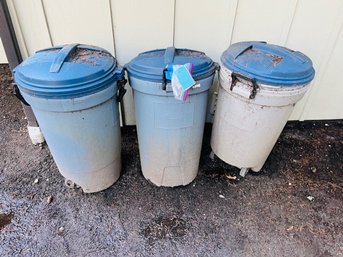 R00 Three Rubbermaid Garbage Cans