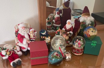 R3 Christmas Lot To Include Santa Figurines, Snow Globe Music Boxes, Collectible Ornaments, Silver Plated Bell