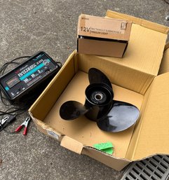 Volvo Repaired Propeller 14.5 X 19 AL 3B, Schumacher Battery Charger, Rectangle Submersible Trailer Light