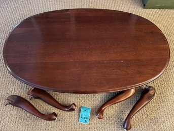 R11 Solid Wood, Mahogany Colored Coffee Table.  All Parts Shown   Approx 16in Tall.  28in X 46in Oval