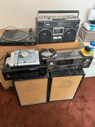 R5 Two Speakers, Panasonic C45 Cassette Player, Sony Walkman, Radioshack Wireless Intercom, Coby CD Stereo