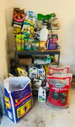 R0 Garage Metal Storage Rack Filled With Gardening/Yard Materials Plant Food, Weed Killer, Round Up, Mulch
