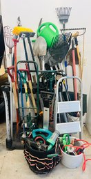 R0 Tool Storage Rack Filled With Shovels, Rakes, Yard Tools, Snow Shovel, Nozzles, Hoses, Step Ladder, Lopper