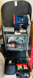 R0 Garage Storage Shelf With Battery Jumper Box, Sunshade, Pro-Logix Charger, Battery Charger, Car Kits.