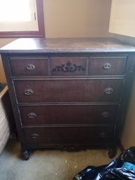 R5 Dark Wood 4-drawer Dresser Chest With Decorative Hardware And Carved Accent. Approx. 40H X 34W X 20D