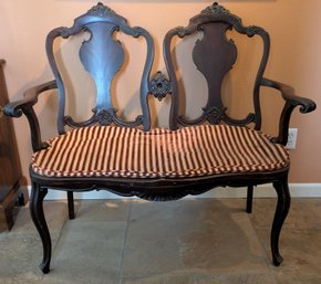Antique Settee With Red Striped Seat Cushion