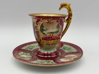Antique Royal Vienna Demitasse Empire Handled Cerise And Gold With Figures In Panel Landscape Scene