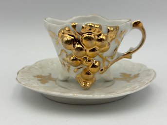 Antique Demitasse German Teacup And Saucer White With Gold Grape Design. Grape Leaves On Saucer. Unmarked, Dat
