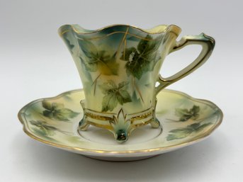 Antique Prussian Demitasse Teacup And Saucer Four Leg Footed Green Leaf Decorations