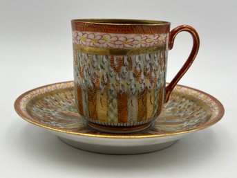 Antique Japanese Demitasse Teacup And Saucer 'Cup Of A Thousand Faces' Ornate Gold Gilt