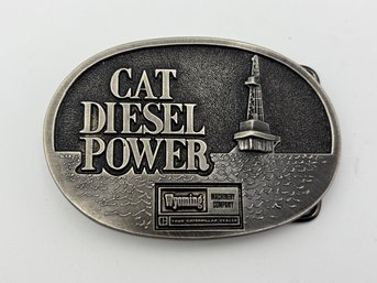Vintage Cat Diesel Power Caterpiller Wyoming Metal Melt Buckle