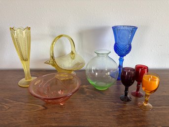 Lot Of Assorted Colored Glass Decor Vases, Bowls, Candles, Etc