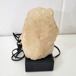 White Himalayan Salt Lamp On Lighted Wood Base