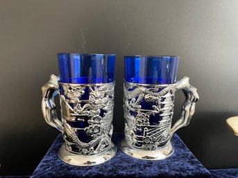 Pair Of Vintage Blue Glass Tankards With Dragon Motif & Silver-Tone Holders