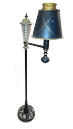 English Painted Tole Floor Lamp Featuring A Black Finish With Gilt Decoration And A Stylized Shade.