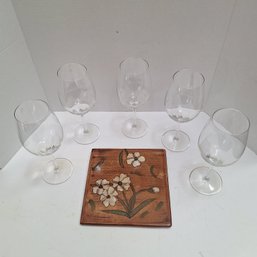 Glasses And Wall Plaque
