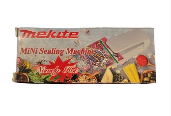 Mekite Branded Mini Handheld Heat Sealer Designed To Reseal Plastic Food Bags.
