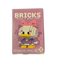 Building Block Set Featuring The Character Daisy Duck.