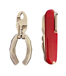SwissTech Micro-Plus EX 9-in-1 Pocket Tool And A Victorinox Swiss Army Knife.