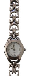 Avon Elegant Open Link Bracelet Watch With A Silver-toned Metal Band And A White Analog Face.