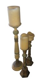 Set Of Three Distressed Pillar Candle Holders.