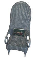 Vintage Wicker Chair With A Fan Back And A Dark Green Finish.