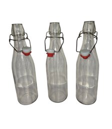 3- Clear Glass Swing-top Bottles