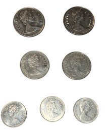 Canadian 25-cent (quarters) And 10-cent (dimes) Coins From Various Years.