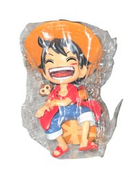 Small PVC Action Figure Of Monkey D. Luffy From The Anime Series One Piece.