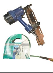 Central Pneumatic Framing Nailer And A Hitachi Air Hose.