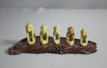 Set Of Five (5) Soapstone Monkeys And A Carved Base