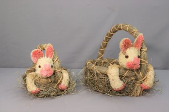 A Pair Of Large & Small Grass Covered Bunnies In Wicker Baskets